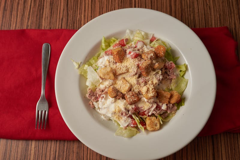 Classic Caesar salad with romaine, croutons, and parmesan